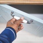 Problem z niesprawnymi kółkami w szufladzie kuchennej – wymiana prowadnic i regulacja